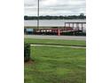Picturesque waterfront with a private dock providing direct access to the serene lake at 333 Lake Howard Nw Dr # 302B, Winter Haven, FL 33880