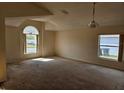 Bright and airy living room with large windows providing ample natural light, ready for personalization at 4526 Oakton Dr, Orlando, FL 32818