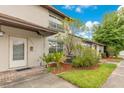 Well-maintained condo with mature landscaping and inviting curb appeal at 5763 Saint Christopher Dr # 55, Orlando, FL 32822