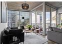 Sleek living room featuring floor-to-ceiling windows and modern decor at 155 S Court Ave # 1202, Orlando, FL 32801