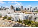 Overhead view of the building with a cityscape and a multi-story parking garage in the background at 304 E South St # 1023, Orlando, FL 32801