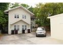Inviting two-story building with spacious parking area and convenient trash receptacles at 415 N Fern Creek Ave, Orlando, FL 32803