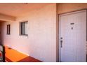 Inviting entrance with door and side window providing natural light at 1162 Carmel Cir # 440, Casselberry, FL 32707