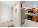 Updated kitchen with modern appliances and seamless flow into entry and other living areas at 1162 Carmel Cir # 440, Casselberry, FL 32707