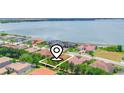 Lakefront property with large backyard, gorgeous water views and mature trees in a gated community at 4120 Juliana Lake Dr, Auburndale, FL 33823