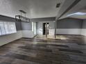 Spacious living room with modern floors, fresh paint, lots of natural light and neutral color palette at 811 Fairview Ave, Altamonte Springs, FL 32701