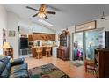 Open-concept living area featuring unique décor, wood floors and lots of light at 549 Mcneal Dr, Deltona, FL 32725