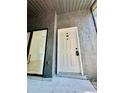 Apartment E front door with secure keyless entry on a textured gray wall at 238 Riverbend Dr # 105, Altamonte Springs, FL 32714