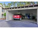 This spacious carport fits two vehicles, and has some extra storage space for bikes at 102 Fairway Dr # 102, Longwood, FL 32779