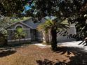 Charming home featuring mature landscaping and a two-car garage at 3144 Ginger Cir, Orlando, FL 32826