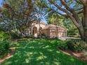 Charming single-story home with mature trees and lush green lawn at 1210 Pallister Ln, Lake Mary, FL 32746
