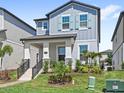 Charming two-story home with well-kept lawn and landscaping at 12067 Eastmoor Dr, Winter Garden, FL 34787