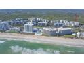 Coastal condo complex on a beach with lush landscape and beautiful views of the ocean at 5300 S Atlantic Ave # 4-302, New Smyrna Beach, FL 32169