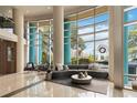 Bright and modern lobby area with stylish seating, large windows, and contemporary design elements at 322 E Central Blvd # 1614, Orlando, FL 32801