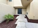 Welcoming front entrance with modern pavers and tropical landscaping, offering great curb appeal at 106 Madrid Dr, Casselberry, FL 32707