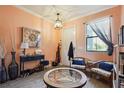 Welcoming living room with a large window, stylish decor, and ample seating at 1350 Royal St George Blvd, Davenport, FL 33896