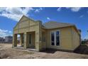 New construction home featuring large windows, covered porch, and modern architectural details at 2976 Embark Trail, St Cloud, FL 34771