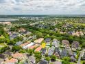 Aerial view of a neighborhood showcasing the home's location and surrounding community amenities at 4094 Oak St, Orlando, FL 32814