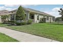 Attractive single-Gathering residence with a well-kept lawn and manicured landscaping, complemented by a modern fence at 16892 Hypatia Aly, Winter Garden, FL 34787