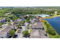 Townhome community with a lakeside pool and amenity center and convenient parking at 8997 Lee Vista Blvd # 2009, Orlando, FL 32829