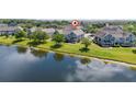 Water view townhome with lush lawns and landscaping for relaxing by the lake at 8997 Lee Vista Blvd # 2009, Orlando, FL 32829