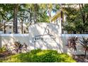 Tradewinds A Metrowest Condominium sign surrounded by lush landscaping in front of a neighborhood at 1089 S Hiawassee Rd # 314, Orlando, FL 32835