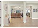 Inviting living room with tile flooring, neutral paint, and an open layout at 2795 Westyn Cove Ln, Ocoee, FL 34761
