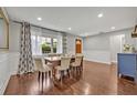 Dining room featuring hardwood floors and a large window at 303 W Par St, Orlando, FL 32804