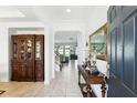 Welcoming foyer with tile flooring, elegant furnishings, and an open view of the living space at 1558 Terra Verde Way, Ocoee, FL 34761