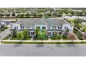 A street view shot of the townhome showing the roof and entry at 16217 Prairie School Dr, Winter Garden, FL 34787