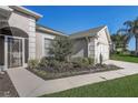 Close up exterior view of a single-story home with beautiful landscaping at 1900 Nw 57Th Ct, Ocala, FL 34482