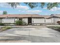 Exterior front elevation of home with dedicated parking at 2309 Sun Valley Cir # 2309, Winter Park, FL 32792