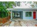 View of covered parking area and front entrance at 510 Brighton Way, Casselberry, FL 32707