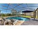 Enjoy the outdoors in this screened-in pool area with plenty of space for lounging and entertaining at 6152 Meriwether, Winter Garden, FL 34787