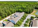Extensive green spaces surround this townhouse community, offering residents a natural retreat at 14751 Clarkson Dr, Orlando, FL 32828