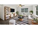 Bright living room featuring stylish furniture, modern decor, and plenty of natural light at 224 Briar Cliff Dr, Longwood, FL 32779