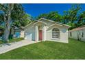 Attractive single-story home with a well-kept lawn, garage, and classic curb appeal at 1073 Hamlet Dr, Maitland, FL 32751