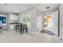 Bright dining area with tile flooring and natural light at 2945 Juniper Dr, Edgewater, FL 32141