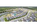 Community aerial view, showcasing the neighborhood layout and nearby amenities at 5826 Wooden Pine Dr, Orlando, FL 32829