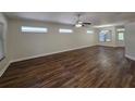 Spacious living room with plenty of natural light and wood flooring at 110 Sophia Marie Cv, Sanford, FL 32771