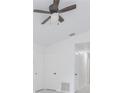 Bright hallway with white walls and modern lighting, leading to various rooms at 13 N Observatory Dr, Orlando, FL 32835