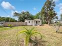 Well-maintained single-story home with inviting entrance and spacious front yard at 2845 Ellis Ave, Lakeland, FL 33803