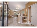 Inviting living space featuring tile floors, neutral walls, and an abundance of natural light at 600 Fallsmead Cir, Longwood, FL 32750