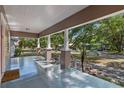 Inviting front porch with ample space, featuring classic columns and a relaxing atmosphere at 216 S Holly Ave, Sanford, FL 32771