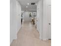 A bright and open foyer featuring neutral walls and tile floors, with views into the living areas at 3532 Douglas Fir Dr, Apopka, FL 32703