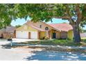 Charming two-story home features a brick-accented facade and a spacious two-car garage at 6630 Abeydon Ct, Orlando, FL 32818