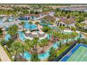 Resort-style community with pool, lazy river, clubhouse, and lush landscaping at 2432 Tangier Dr, Kissimmee, FL 34747