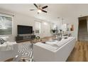 Bright and airy living room with contemporary furnishings and natural light at 3542 Shallot Dr # 108, Orlando, FL 32835