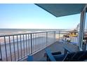 Relax on the private balcony, complete with seating, offering stunning oceanfront views of the beach at 5203 S Atlantic Ave # 416B, New Smyrna Beach, FL 32169