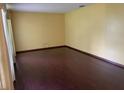 Bright living room with hardwood floors and large windows at 8129 Granada Blvd, Orlando, FL 32836